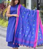  royal blue sleeveless linen suit set with contrast pink border dupatta