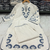  off-white and indigo blue applique work pure cotton straight co-ord tunics set
