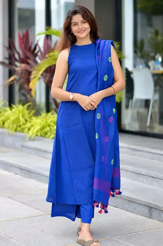  royal blue sleeveless linen suit set with contrast pink border dupatta