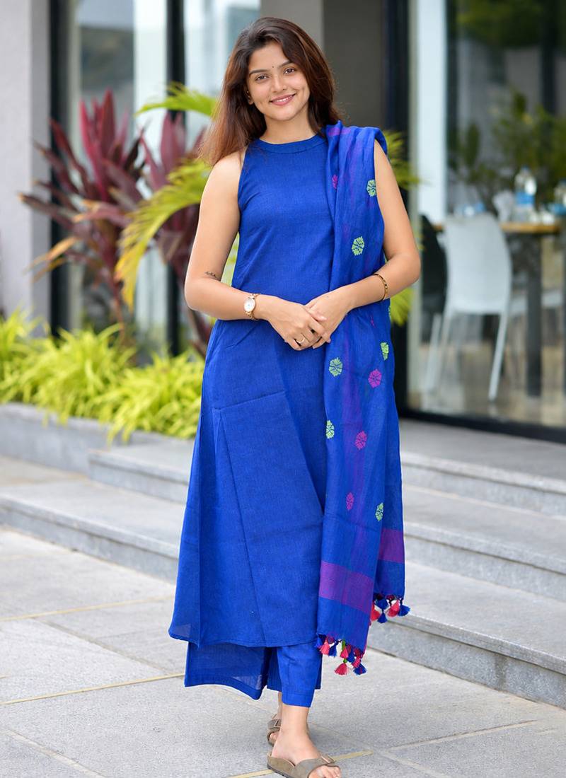  royal blue sleeveless linen suit set with contrast pink border dupatta