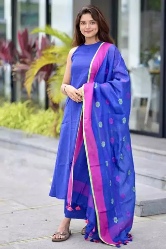  royal blue sleeveless linen suit set with contrast pink border dupatta