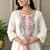  off-white multi-color embroidered kurti set with scallop pants