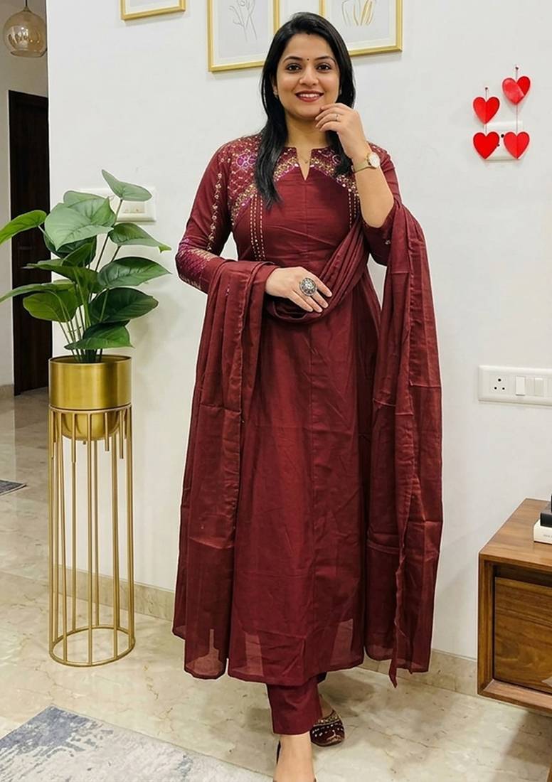 Beautiful wine embroidered chanderi flared suit set