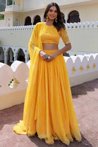 Enchanting Yellow Laheriya Printed Haldi Wear Lehenga Choli With Dupatta