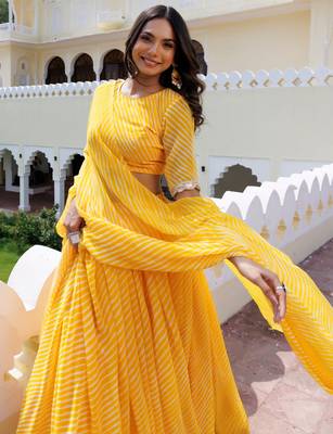 Enchanting Yellow Laheriya Printed Haldi Wear Lehenga Choli With Dupatta 3