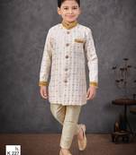 Off white jacket attached indo-western  set with computer stone work, lace & fancy buttons