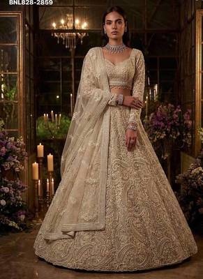 Beige net heavily embroidered bridal reception lehenga choli set 1