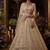 Beige net heavily embroidered bridal reception lehenga choli set