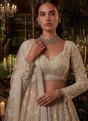Beige net heavily embroidered bridal reception lehenga choli set 3