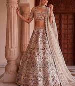 Beige silk blend embroidered heavy bridal wedding lehenga choli set