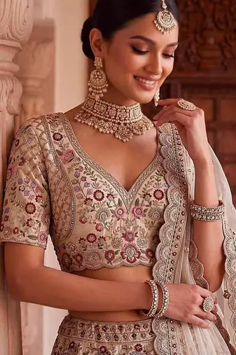 Beige silk blend embroidered heavy bridal wedding lehenga choli set