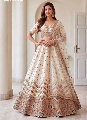 Off-white silk blend embroidered designer reception lehenga choli set 1