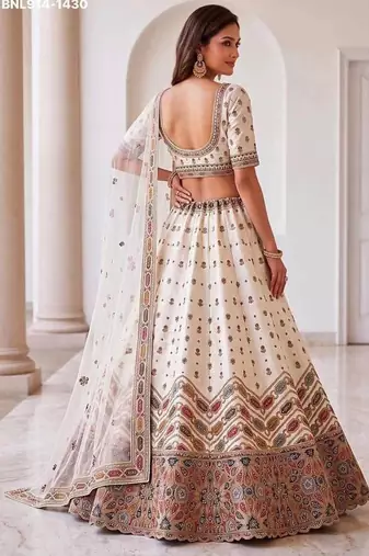 Off-white silk blend embroidered designer reception lehenga choli set
