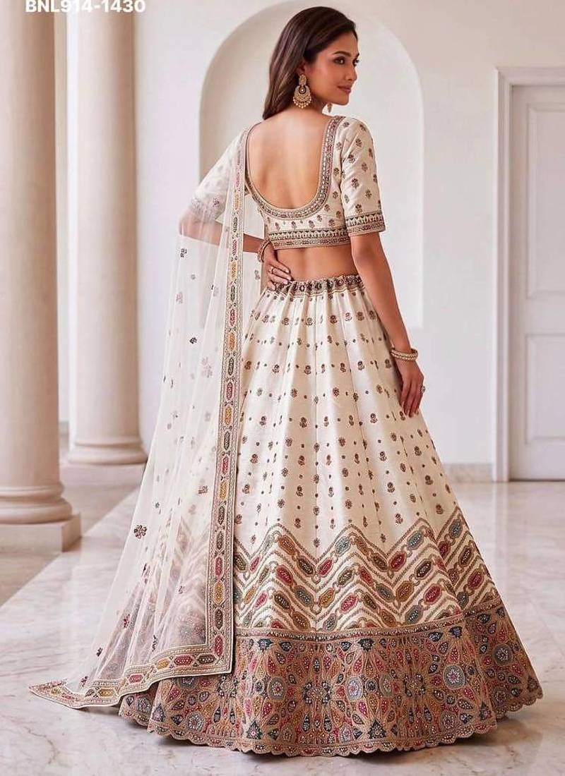 Off-white silk blend embroidered designer reception lehenga choli set