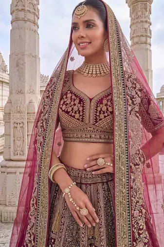 Rani pink velvet embroidered heavy royal bridal lehenga choli set