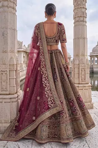 Rani pink velvet embroidered heavy royal bridal lehenga choli set