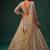Beige net heavily embroidered royal bridal reception lehenga choli set