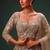 Beige net heavily embroidered royal bridal reception lehenga choli set