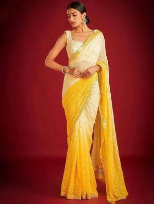 Yellow elegant designer heavy embroidered sequin georgette saree 1