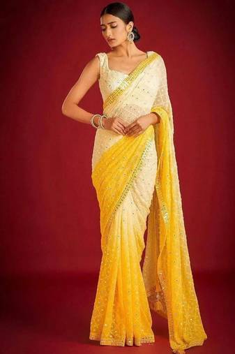 Yellow elegant designer heavy embroidered sequin georgette saree
