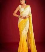 Yellow elegant designer heavy embroidered sequin georgette saree