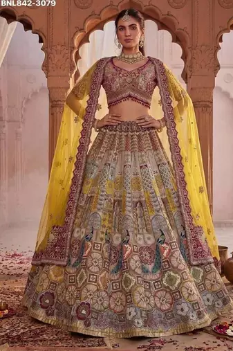 Off-white silk blend embroidered multi-color bridal lehenga choli set