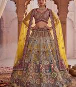 Off-white silk blend embroidered multi-color bridal lehenga choli set