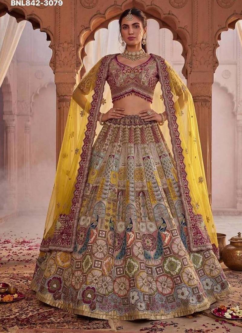 Off-white silk blend embroidered multi-color bridal lehenga choli set