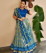 Women Ikat Printed Tasar Silk Lehenga Choli Set with Foil Print Detailing