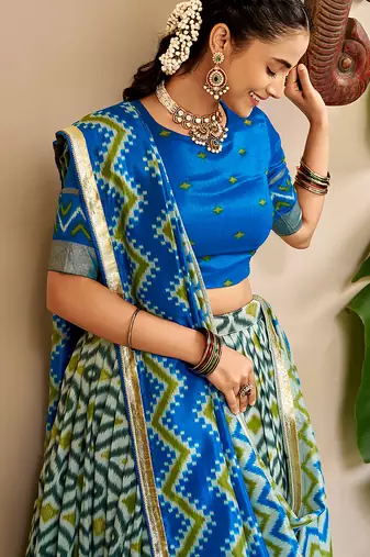 Women Ikat Printed Tasar Silk Lehenga Choli Set with Foil Print Detailing