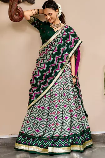 Women Ikat Printed Tasar Silk Lehenga Choli Set with Foil Print Detailing