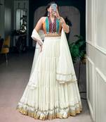 women embroidered off white tiered lehenga set with bandhani mirror work blouse for garba & navratri - free size