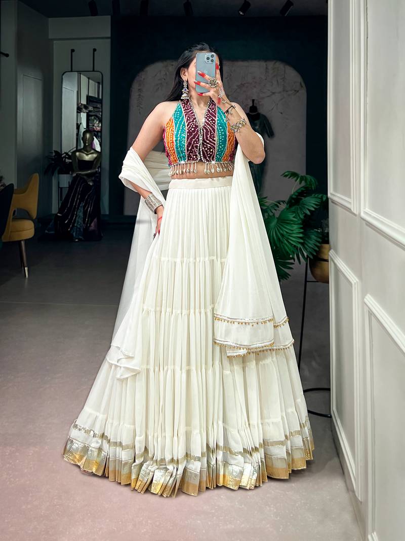 women embroidered off white tiered lehenga set with bandhani mirror work blouse for garba & navratri - free size