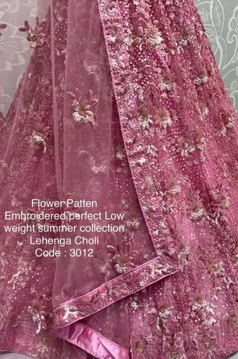 Pink net embroidered lehenga choli