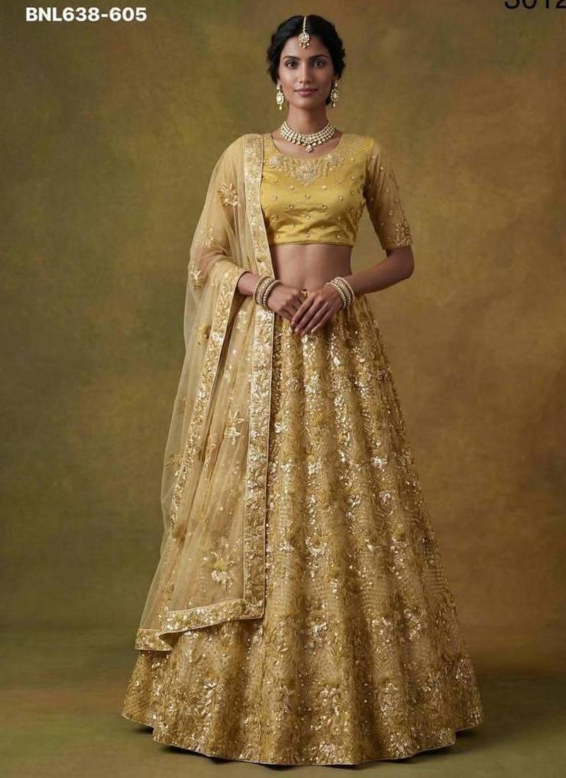 Mustard net embroidered lehenga choli