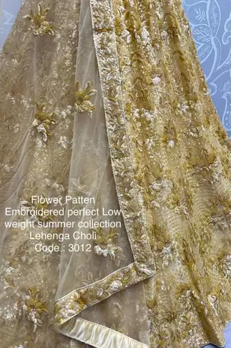 Mustard net embroidered lehenga choli