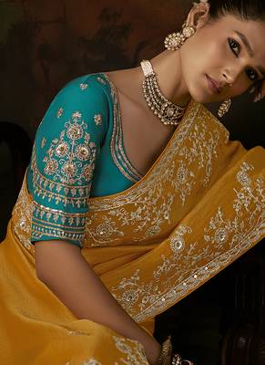 mustard yellow faux tissue saree with contrast embroidered blouse 2