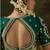 pista green faux tissue saree with contrast embroidered blouse