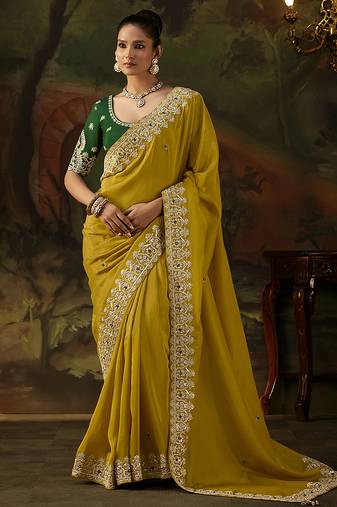 mustard faux tissue saree with contrast embroidered blouse
