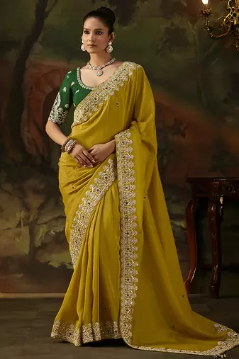 mustard faux tissue saree with contrast embroidered blouse