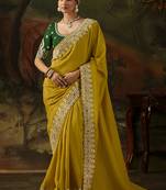 mustard faux tissue saree with contrast embroidered blouse