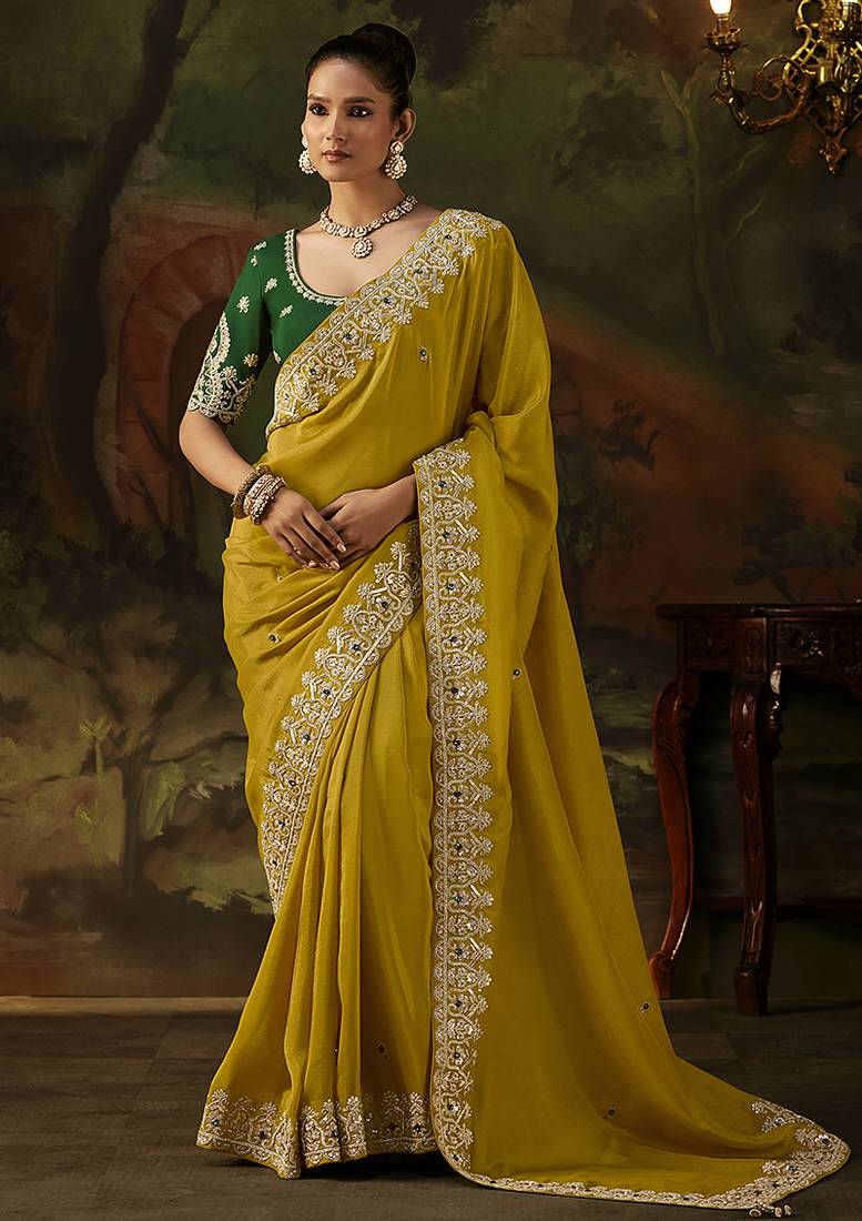 mustard faux tissue saree with contrast embroidered blouse