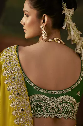 mustard faux tissue saree with contrast embroidered blouse