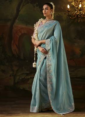sky blue faux tissue saree with contrast embroidered blouse 1
