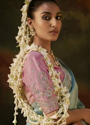 sky blue faux tissue saree with contrast embroidered blouse 2