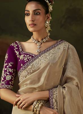 beige faux tissue saree with contrast embroidered blouse 2