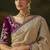 beige faux tissue saree with contrast embroidered blouse