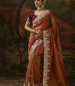 rust faux tissue saree with contrast embroidered blouse
