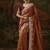 rust faux tissue saree with contrast embroidered blouse