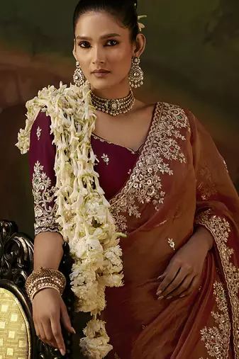 rust faux tissue saree with contrast embroidered blouse